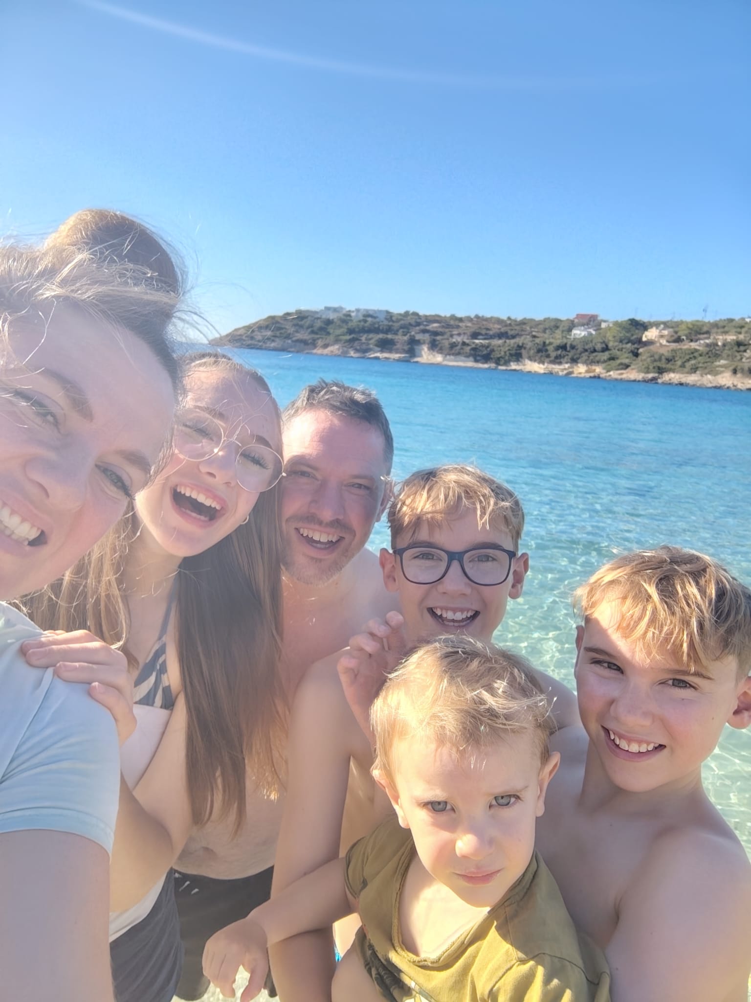 Lana Evans with her family by the sea
